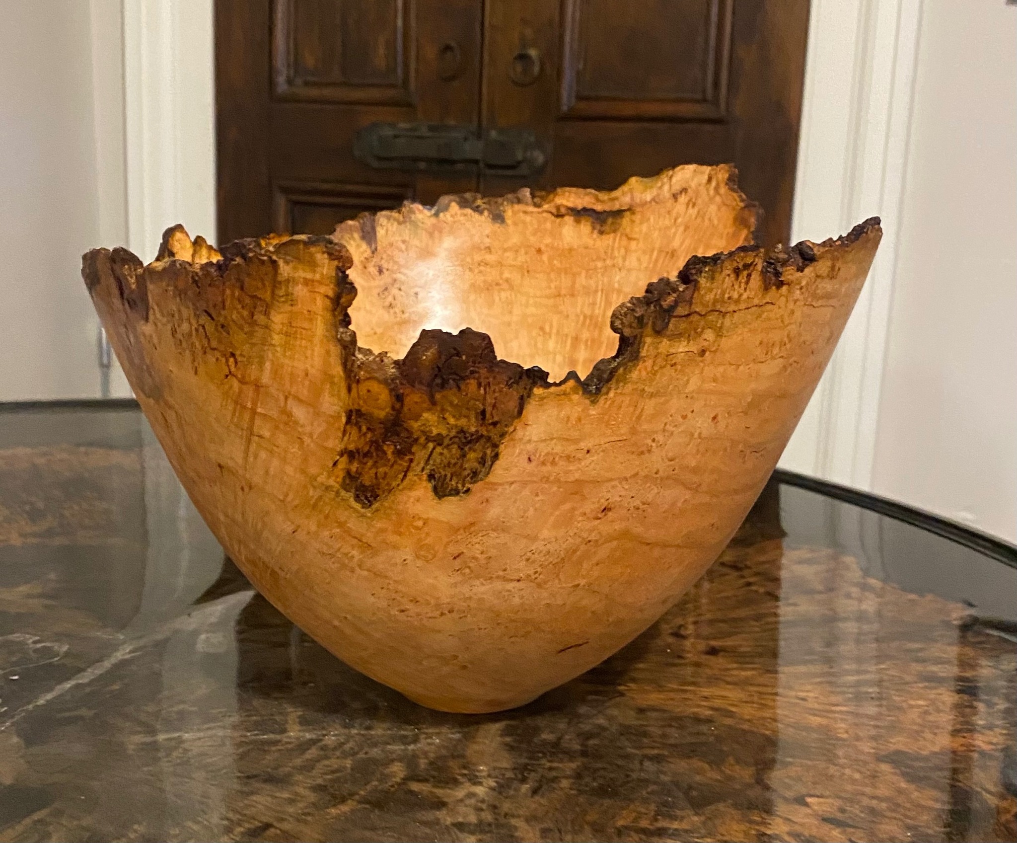 Turned bowl with figured wood pattern.