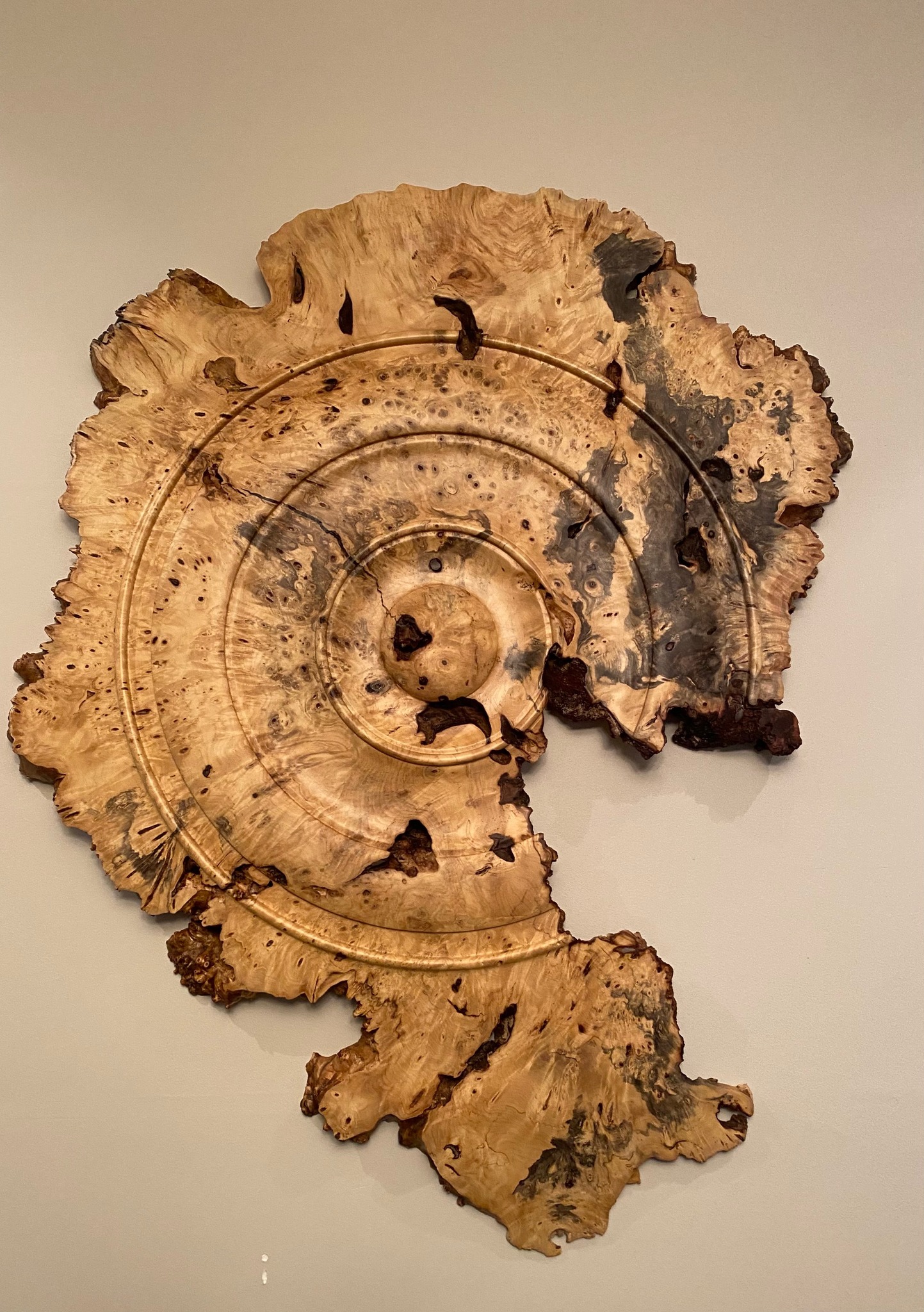 Wall art piece in figured wood.